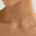 Taralynn-1-5-stone-arc-necklace-14k-model-0166-edit-cropped-final-v2-2