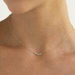 Taralynn-1-5-stone-arc-necklace-14k-model-0166-edit-cropped-final-v2-2