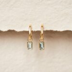 keira-18-amelia-huggie-earrings-with-sky-blue-topaz-baguette-charm-gv-lookbook-35-edit